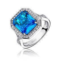 Silver fashionable (925) ring with aquamarine colored zirconia
