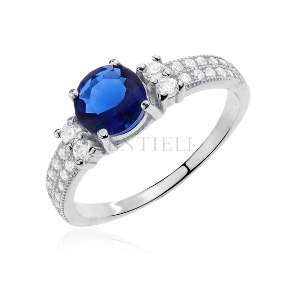 Silver (925) ring with sapphire & white zirconia