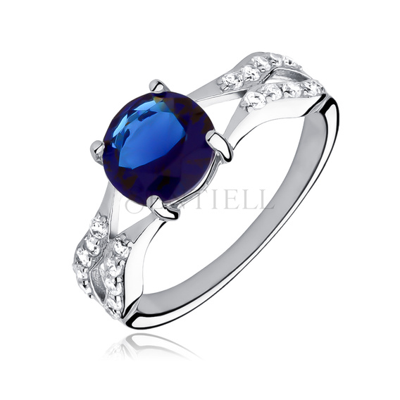 Silver fashionable (925) ring with sapphire colored zirconia