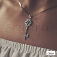 Silver (925) key pendant with zirconia