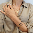 Silver (925) gold-plated bracelet with black cord and cross