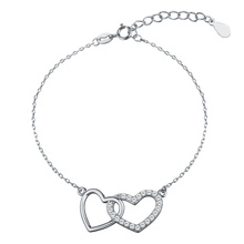 Silver (925) bracelet with compared hearts, zirconia