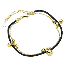 Silver (925) gold-plated bracelet with black cord and balls