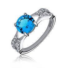 Silver fashionable (925) ring with aquamarine colored zirconia