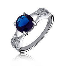 Silver fashionable (925) ring with sapphire colored zirconia